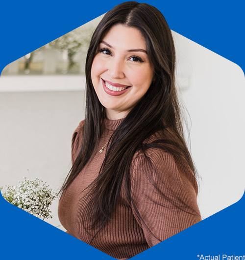 Person wearing invisalign trays smiling